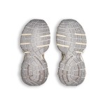 Balenciaga Runner Kith Four.Color 7.0 - Bold Strapped Beige Sneakers for a Futuristic Look Balenciaga Runner Kith Four.Color 7.0 - Beige Sneakers with Criss-Cross Straps