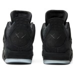 Side view of the KAWS x Air Jordan 4 Retro "Black" 930155-001 sneaker in all-black with premium materials