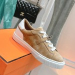 Hermes H232176Z 90350 Beige & White Sneakers – Iconic Design and Craftsmanship Hermes Mens Sneaker H232176Z 90350 in Beige and White – Front View of Luxury Sneakers with Contrasting Stripes
