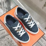 Hermes H232176Z 90350 Brown & White Sneakers – Iconic Design and Premium Craftsmanship Hermes Mens Sneaker H232176Z 90350 in Brown and White – Front View of Luxury Sneakers with Contrasting Stripes