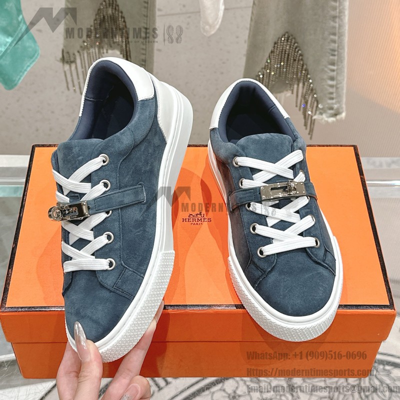 Hermes H232176Z 90350 Brown & White Sneakers – Iconic Design and Premium Craftsmanship Hermes Mens Sneaker H232176Z 90350 in Brown and White – Front View of Luxury Sneakers with Contrasting Stripes