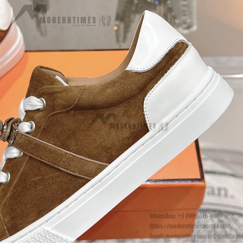 Hermes H232176Z 90350 Brown & White Sneakers – Iconic Design and Premium Craftsmanship Hermes Mens Sneaker H232176Z 90350 in Brown and White – Front View of Luxury Sneakers with Contrasting Stripes