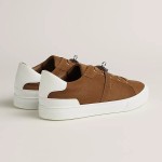 Hermes H232176Z 90350 Brown & White Sneakers – Iconic Design and Premium Craftsmanship Hermes Mens Sneaker H232176Z 90350 in Brown and White – Front View of Luxury Sneakers with Contrasting Stripes