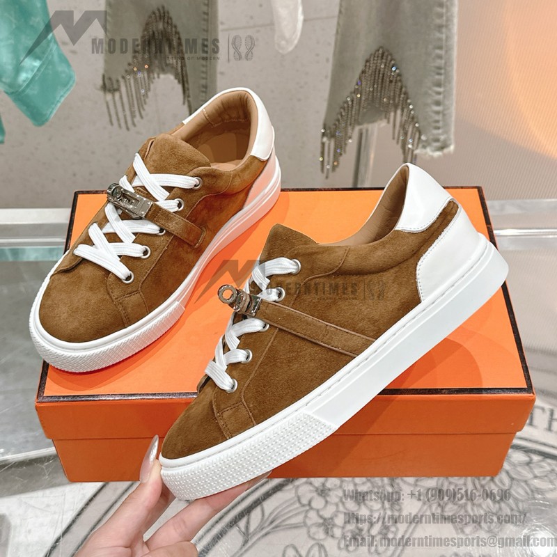 Hermes H232176Z 90350 Brown & White Sneakers – Iconic Design and Premium Craftsmanship Hermes Mens Sneaker H232176Z 90350 in Brown and White – Front View of Luxury Sneakers with Contrasting Stripes