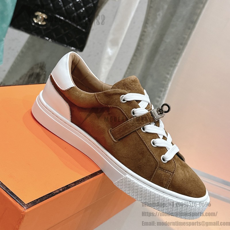 Hermes H232176Z 90350 Brown & White Sneakers – Iconic Design and Premium Craftsmanship Hermes Mens Sneaker H232176Z 90350 in Brown and White – Front View of Luxury Sneakers with Contrasting Stripes