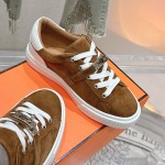 Hermes H232176Z 90350 Brown & White Sneakers – Iconic Design and Premium Craftsmanship Hermes Mens Sneaker H232176Z 90350 in Brown and White – Front View of Luxury Sneakers with Contrasting Stripes