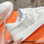 Hermes H232176Z 90350 White Sneakers – Iconic Perforated Design and Premium Craftsmanship Hermes Mens Sneaker H232176Z 90350 in White – Front View of Luxurious All-White Sneakers with Iconic Perforations