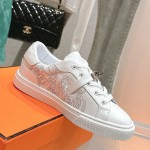 Hermes H232176Z 90350 White Sneakers – Iconic Perforated Design and Premium Craftsmanship Hermes Mens Sneaker H232176Z 90350 in White – Front View of Luxurious All-White Sneakers with Iconic Perforations