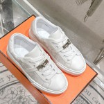 Hermes H232176Z 90350 White Sneakers – Iconic Perforated Design and Premium Craftsmanship Hermes Mens Sneaker H232176Z 90350 in White – Front View of Luxurious All-White Sneakers with Iconic Perforations