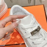 Hermes H232176Z 90350 White Sneakers – Iconic Perforated Design and Premium Craftsmanship Hermes Mens Sneaker H232176Z 90350 in White – Front View of Luxurious All-White Sneakers with Iconic Perforations