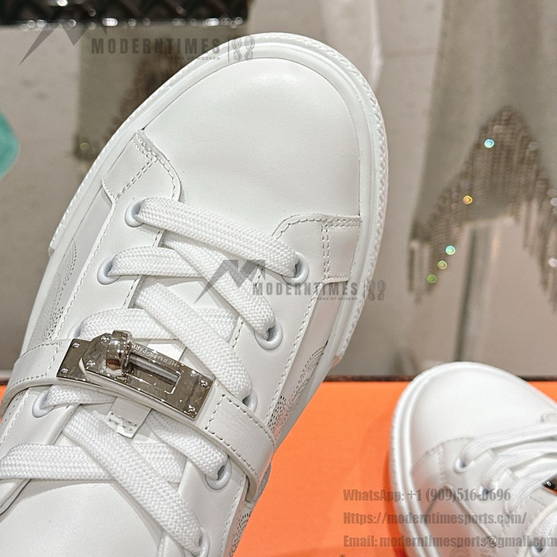 Hermes H232176Z 90350 White Sneakers – Iconic Perforated Design and Premium Craftsmanship Hermes Mens Sneaker H232176Z 90350 in White – Front View of Luxurious All-White Sneakers with Iconic Perforations