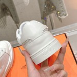 Hermes H232176Z 90350 Beige & White Sneakers – Iconic Design and Craftsmanship Hermes Mens Sneaker H232176Z 90350 in Beige and White – Front View of Luxury Sneakers with Contrasting Stripes