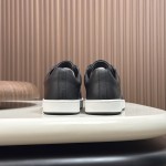 Hermes H242933Z H69440 White & Blue Sneakers – Side Detail of Iconic Stripes Hermes Mens Sneaker H242933Z H69440 in White and Blue – Front View of Luxury Sneakers with Navy Blue Stripes