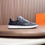 Hermes H242933Z H69440 White & Blue Sneakers – Side Detail of Iconic Stripes Hermes Mens Sneaker H242933Z H69440 in White and Blue – Front View of Luxury Sneakers with Navy Blue Stripes