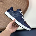 Hermes H242933Z H69440 White & Blue Sneakers – Side Detail of Iconic Stripes Hermes Mens Sneaker H242933Z H69440 in White and Blue – Front View of Luxury Sneakers with Navy Blue Stripes
