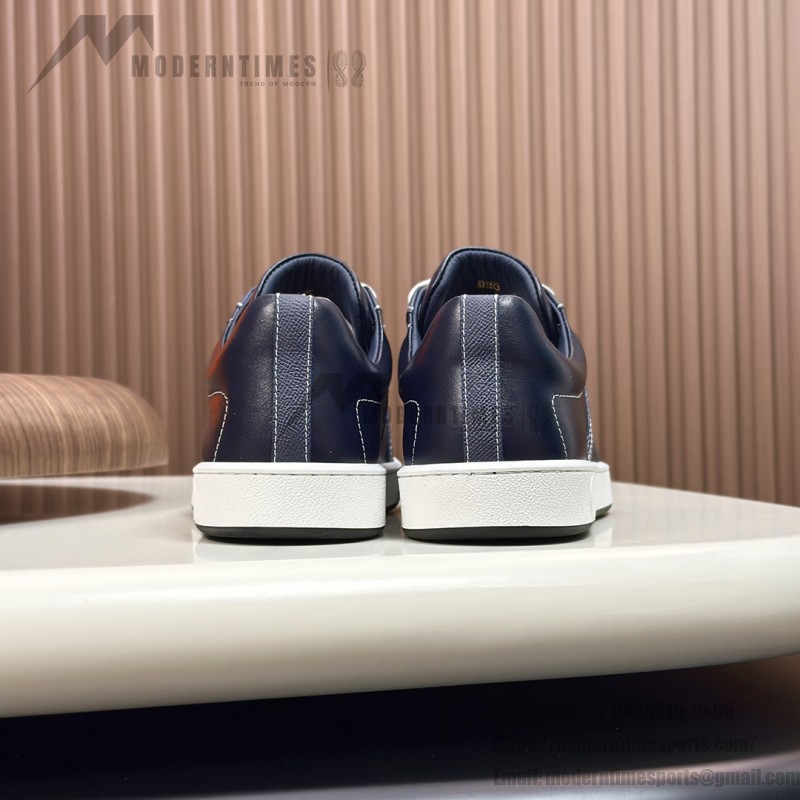 Hermes H242933Z H69440 White & Blue Sneakers – Side Detail of Iconic Stripes Hermes Mens Sneaker H242933Z H69440 in White and Blue – Front View of Luxury Sneakers with Navy Blue Stripes