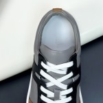 Hermes H242933Z H69440 Grey & Brown Sneakers – Side Detail of Stripes Hermes Mens Sneaker H242933Z H69440 in Grey and Brown – Front View of Luxury Sneakers with Iconic Leather Stripes