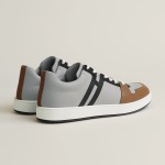 Hermes H242933Z H69440 Grey & Brown Sneakers – Side Detail of Stripes Hermes Mens Sneaker H242933Z H69440 in Grey and Brown – Front View of Luxury Sneakers with Iconic Leather Stripes