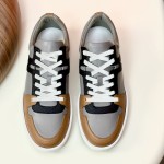 Hermes H242933Z H69440 Grey & Brown Sneakers – Side Detail of Stripes Hermes Mens Sneaker H242933Z H69440 in Grey and Brown – Front View of Luxury Sneakers with Iconic Leather Stripes