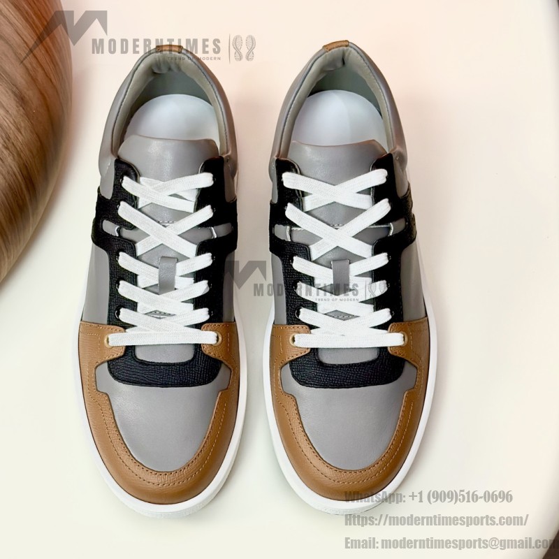 Hermes H242933Z H69440 Grey & Brown Sneakers – Side Detail of Stripes Hermes Mens Sneaker H242933Z H69440 in Grey and Brown – Front View of Luxury Sneakers with Iconic Leather Stripes