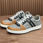 Hermes H242933Z H69440 Grey & Brown Sneakers – Side Detail of Stripes Hermes Mens Sneaker H242933Z H69440 in Grey and Brown – Front View of Luxury Sneakers with Iconic Leather Stripes