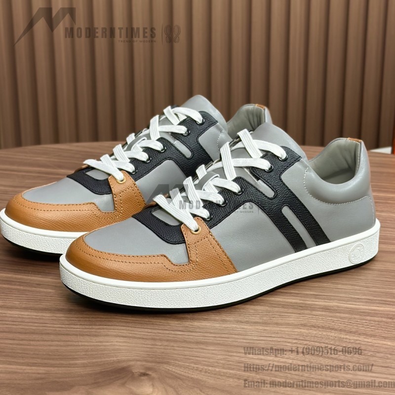 Hermes H242933Z H69440 Grey & Brown Sneakers – Side Detail of Stripes Hermes Mens Sneaker H242933Z H69440 in Grey and Brown – Front View of Luxury Sneakers with Iconic Leather Stripes