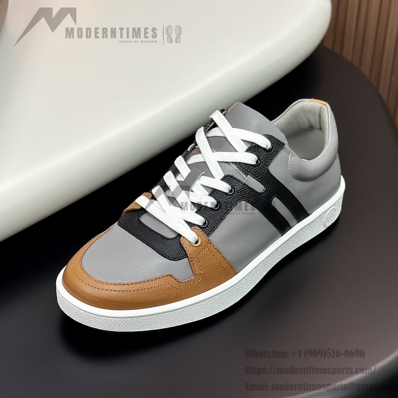Hermes H242933Z H69440 Grey & Brown Sneakers – Side Detail of Stripes Hermes Mens Sneaker H242933Z H69440 in Grey and Brown – Front View of Luxury Sneakers with Iconic Leather Stripes