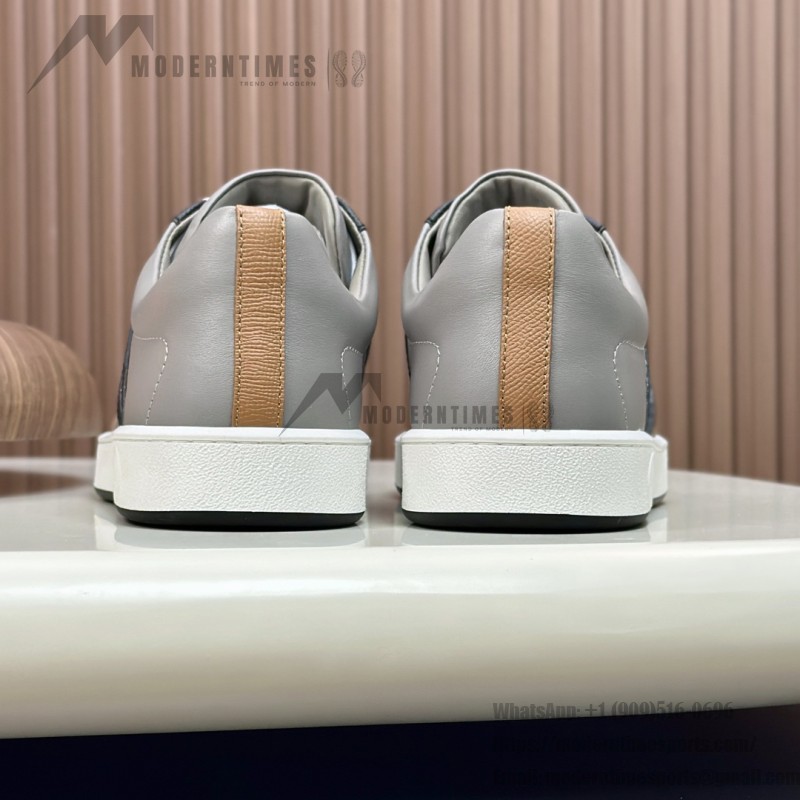 Hermes H242933Z H69440 Grey & Brown Sneakers – Side Detail of Stripes Hermes Mens Sneaker H242933Z H69440 in Grey and Brown – Front View of Luxury Sneakers with Iconic Leather Stripes