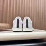 Hermes H242933Z H69440 White & Blue Sneakers – Side Detail of Iconic Stripes Hermes Mens Sneaker H242933Z H69440 in White and Blue – Front View of Luxury Sneakers with Navy Blue Stripes