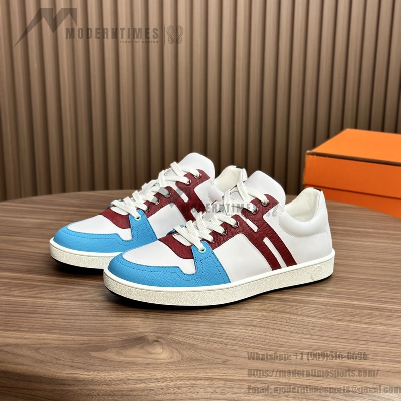 Hermes H242933Z H69440 White & Blue Sneakers – Side Detail of Iconic Stripes Hermes Mens Sneaker H242933Z H69440 in White and Blue – Front View of Luxury Sneakers with Navy Blue Stripes