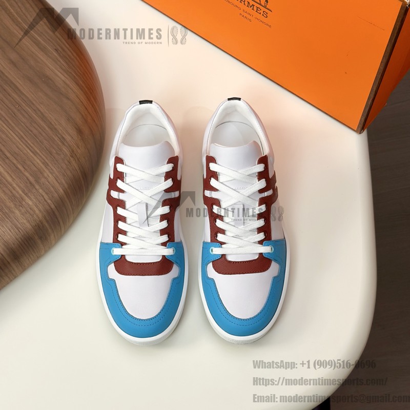 Hermes H242933Z H69440 White & Blue Sneakers – Side Detail of Iconic Stripes Hermes Mens Sneaker H242933Z H69440 in White and Blue – Front View of Luxury Sneakers with Navy Blue Stripes