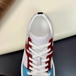 Hermes H242933Z H69440 White & Blue Sneakers – Side Detail of Iconic Stripes Hermes Mens Sneaker H242933Z H69440 in White and Blue – Front View of Luxury Sneakers with Navy Blue Stripes
