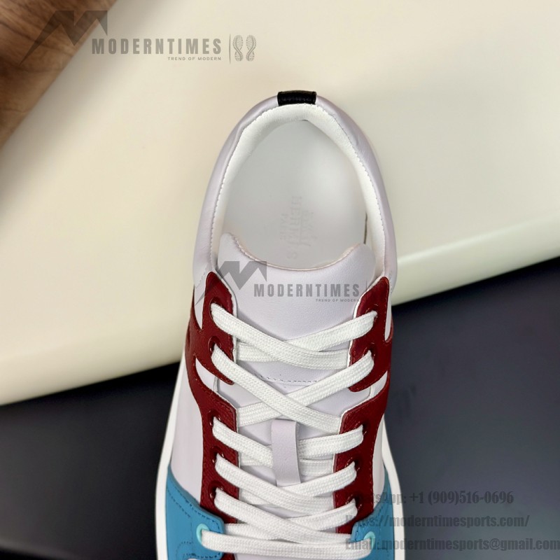 Hermes H242933Z H69440 White & Blue Sneakers – Side Detail of Iconic Stripes Hermes Mens Sneaker H242933Z H69440 in White and Blue – Front View of Luxury Sneakers with Navy Blue Stripes