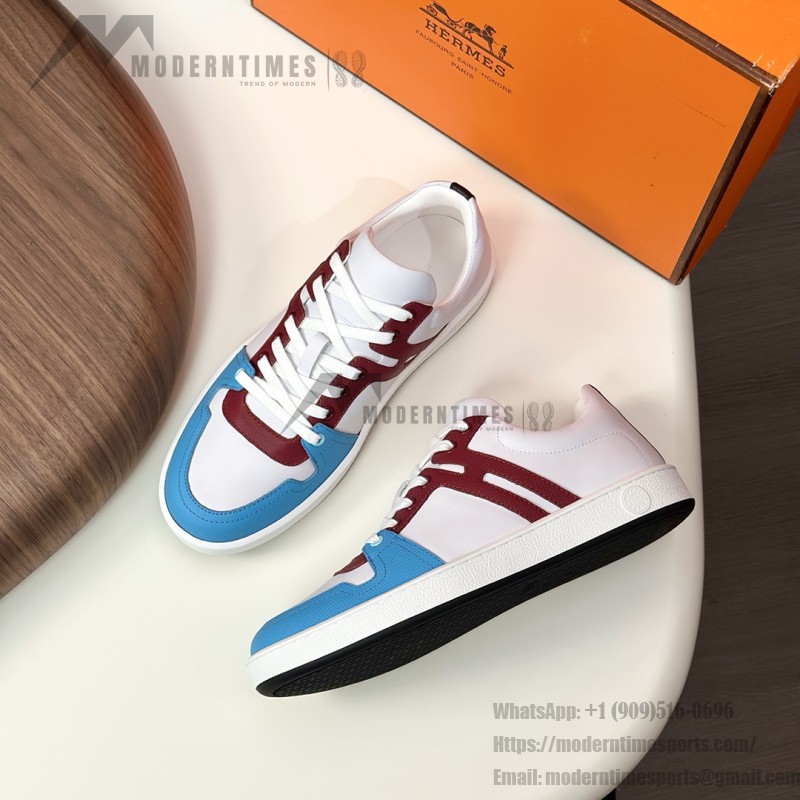 Hermes H242933Z H69440 White & Blue Sneakers – Side Detail of Iconic Stripes Hermes Mens Sneaker H242933Z H69440 in White and Blue – Front View of Luxury Sneakers with Navy Blue Stripes