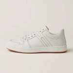 Hermes H242933Z H69440 All-White Sneakers – Clean, Iconic Luxury Style Hermes Mens Sneaker H242933Z H69440 in All-White – Front View of Premium White Leather Sneakers with Minimalist Design