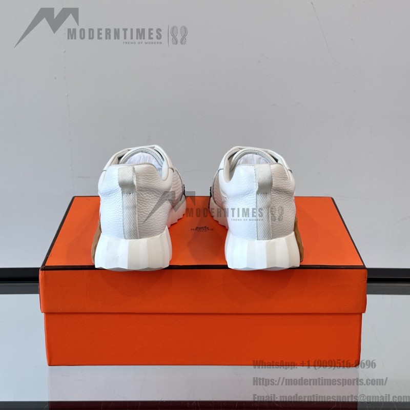Hermes H251121Z 02360 White Sneakers – Iconic H Logo on Heel Hermes Mens Sneaker H251121Z 02360 in White – Front View of Luxury Fashion Sneakers with Orange H Logo