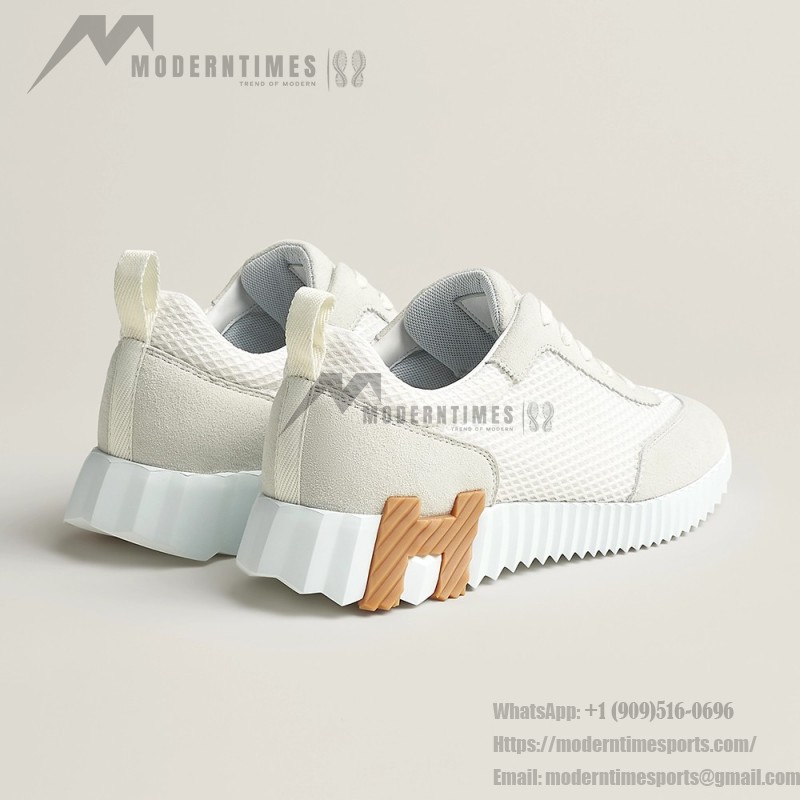 Hermes H251121Z 02360 White Sneakers – Iconic H Logo on Heel Hermes Mens Sneaker H251121Z 02360 in White – Front View of Luxury Fashion Sneakers with Orange H Logo