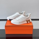 Hermes H251121Z 02360 White Sneakers – Iconic H Logo on Heel Hermes Mens Sneaker H251121Z 02360 in White – Front View of Luxury Fashion Sneakers with Orange H Logo