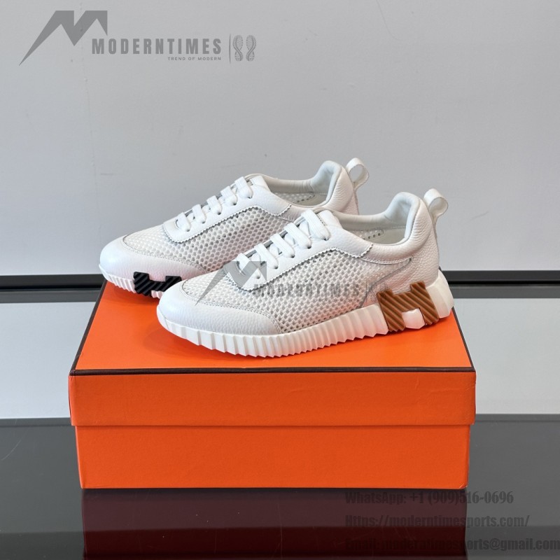 Hermes H251121Z 02360 White Sneakers – Iconic H Logo on Heel Hermes Mens Sneaker H251121Z 02360 in White – Front View of Luxury Fashion Sneakers with Orange H Logo