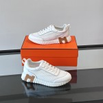 Hermes H251121Z 02360 White Sneakers – Iconic H Logo on Heel Hermes Mens Sneaker H251121Z 02360 in White – Front View of Luxury Fashion Sneakers with Orange H Logo
