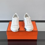 Hermes H251121Z 02360 White Sneakers – Iconic H Logo on Heel Hermes Mens Sneaker H251121Z 02360 in White – Front View of Luxury Fashion Sneakers with Orange H Logo
