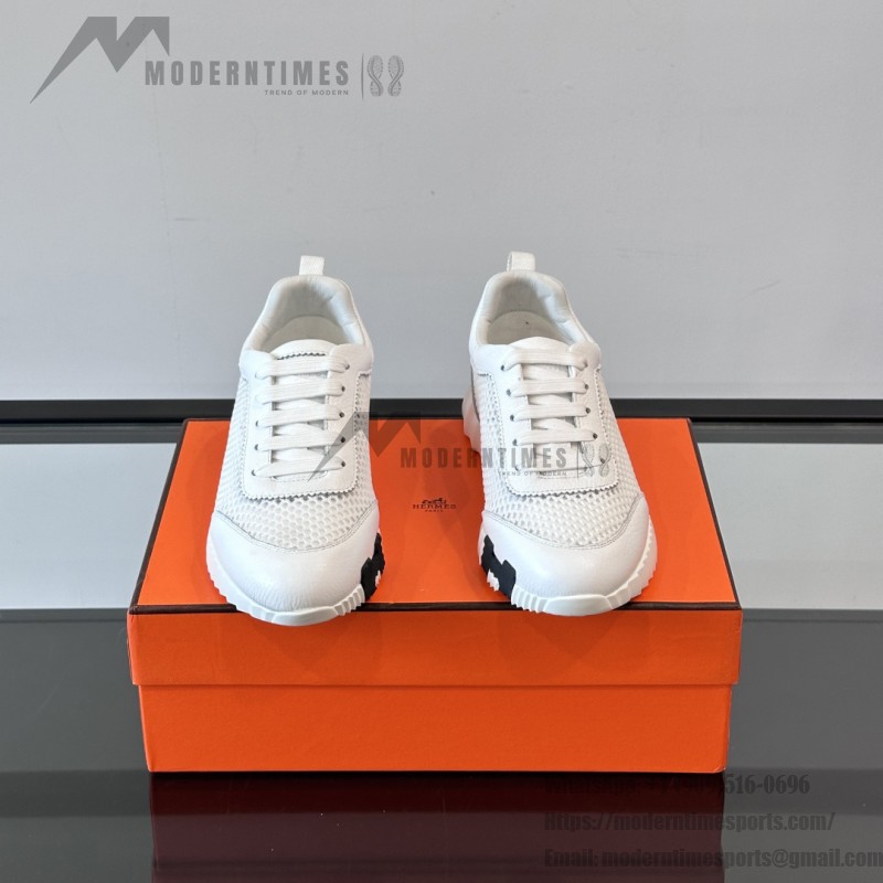 Hermes H251121Z 02360 White Sneakers – Iconic H Logo on Heel Hermes Mens Sneaker H251121Z 02360 in White – Front View of Luxury Fashion Sneakers with Orange H Logo