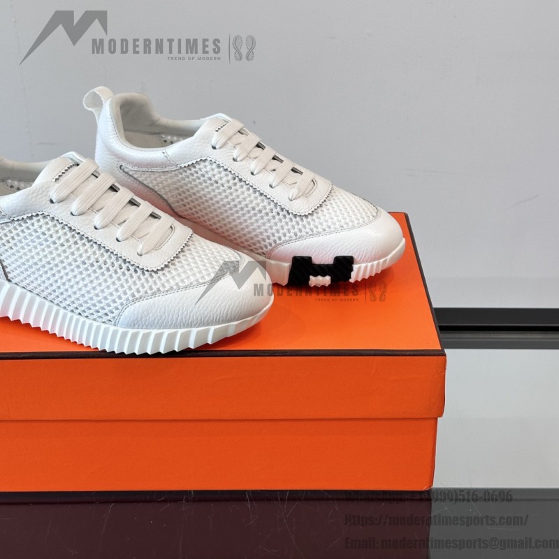 Hermes H251121Z 02360 White Sneakers – Iconic H Logo on Heel Hermes Mens Sneaker H251121Z 02360 in White – Front View of Luxury Fashion Sneakers with Orange H Logo