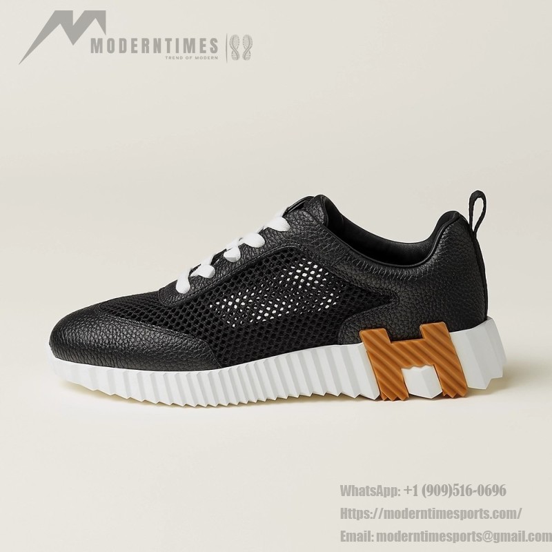 Hermes H251121Z 02360 Black Sneakers – Iconic H Logo on Heel Hermes Mens Sneaker H251121Z 02360 in Black – Front View of Luxury Black Sneakers with Orange H Logo
