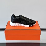 Hermes H251121Z 02360 Black Sneakers – Iconic H Logo on Heel Hermes Mens Sneaker H251121Z 02360 in Black – Front View of Luxury Black Sneakers with Orange H Logo
