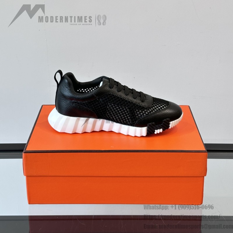 Hermes H251121Z 02360 Black Sneakers – Iconic H Logo on Heel Hermes Mens Sneaker H251121Z 02360 in Black – Front View of Luxury Black Sneakers with Orange H Logo