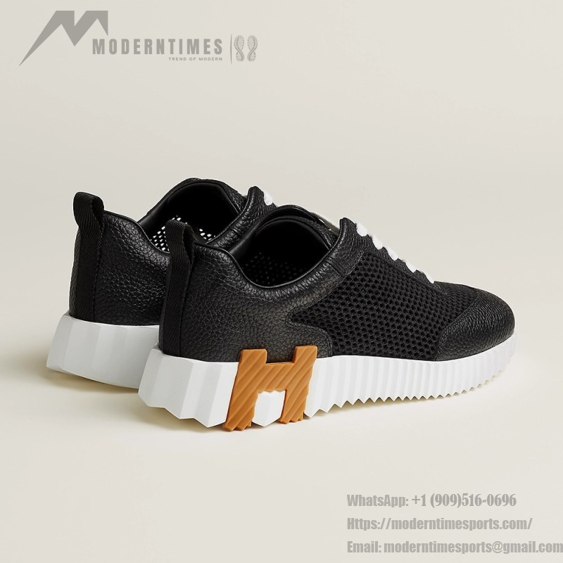 Hermes H251121Z 02360 Black Sneakers – Iconic H Logo on Heel Hermes Mens Sneaker H251121Z 02360 in Black – Front View of Luxury Black Sneakers with Orange H Logo