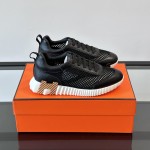 Hermes H251121Z 02360 Black Sneakers – Iconic H Logo on Heel Hermes Mens Sneaker H251121Z 02360 in Black – Front View of Luxury Black Sneakers with Orange H Logo
