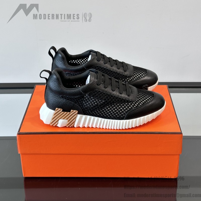 Hermes H251121Z 02360 Black Sneakers – Iconic H Logo on Heel Hermes Mens Sneaker H251121Z 02360 in Black – Front View of Luxury Black Sneakers with Orange H Logo