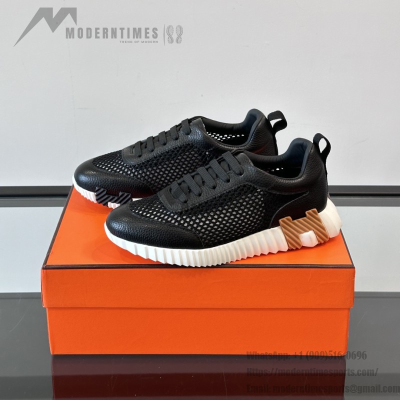 Hermes H251121Z 02360 Black Sneakers – Iconic H Logo on Heel Hermes Mens Sneaker H251121Z 02360 in Black – Front View of Luxury Black Sneakers with Orange H Logo